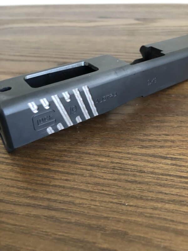 Glock- Enhanced side serrations